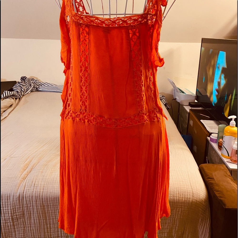 FREE PEOPLE Crochet romper. Color orange. Size XS